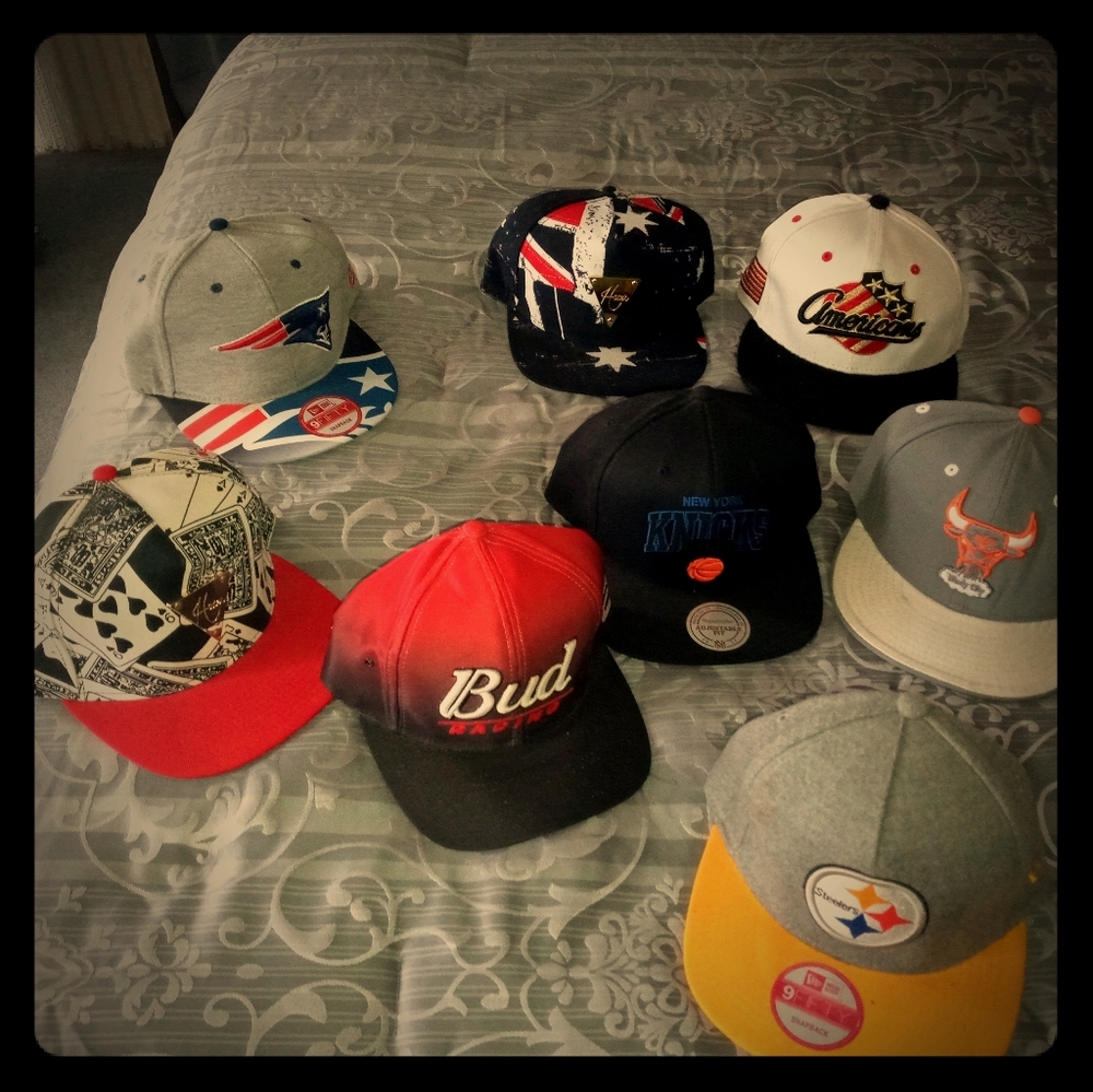 NFL and NBA snapbacks pre-owned still in good cond